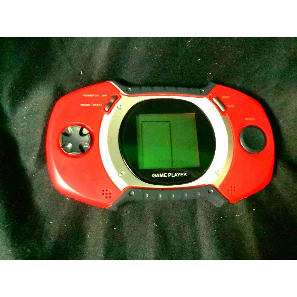 Vintage Atari game control player and handheld